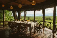 Open dining terrace at Katavi Wildlife Camp overlooking the plains of Katavi National Park