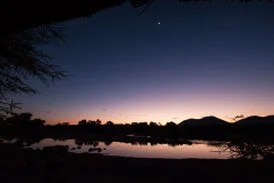 Wide panoramic view of Ruaha National Park showing remote wilderness, dry-season vegetation and open safari landscapes