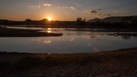 Wide panoramic view of Ruaha National Park showing remote wilderness, dry-season vegetation and open safari landscapes